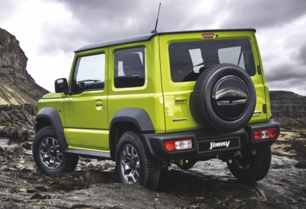 Suzuki Jimny Kinetic Yellow rear on mud