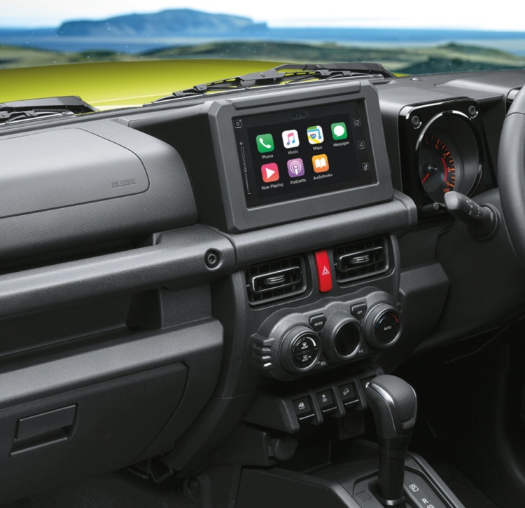 Jimny rugged interior with functional dash is built tough.